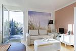 Wohnbereich mit TV - Hafenhaus Leuchtturm - Top-Hundeurlaub