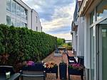 seitlicher Blick auf der Terrasse zur Müritz - Am Seeufer 59b Fewo Seensucht - Top-Hundeurlaub