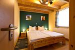 Schlafzimmer mit Doppelbett - Ferienhaus Jabel 28 - Top-Hundeurlaub