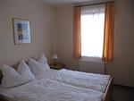 Schlafzimmer mit Doppelbett - Albatros App. 02 EG/R - Top-Hundeurlaub