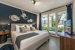 Schlafzimmer - Ferienwohnung Terrasse am Haff mit Wellnessbereich, Sauna und großen Balkon - Top-Hundeurlaub