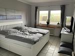 Schlafzimmer - Freundliche Ferienwohnung direkt hinter dem Deich - Top-Hundeurlaub