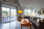 Wohnzimmer - Ferienhaus  Achteck am Deich, Graureiherweg 4a - Top-Hundeurlaub