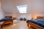 Schlafzimmer - Ferienhaus  Achteck am Deich, Graureiherweg 4a - Top-Hundeurlaub