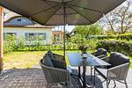 Terrasse mit Tisch und Stühlen - Windlooper 2 - Top-Hundeurlaub