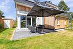 Terrasse mit Essbereich und Sonnenschirm - Windlooper 2 - Top-Hundeurlaub