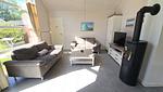 Wohnzimmer - Ferienhaus "Kiek Ut" im Ferienpark Holm an der Ostsee - Top-Hundeurlaub