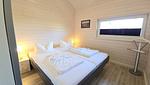 Schlafzimmer - Ferienhaus "Kiek Ut" im Ferienpark Holm an der Ostsee - Top-Hundeurlaub