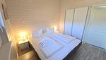 Schlafzimmer - Ferienhaus "Kiek Ut" im Ferienpark Holm an der Ostsee - Top-Hundeurlaub