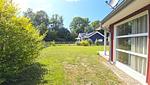Garten - Ferienhaus "Kiek Ut" im Ferienpark Holm an der Ostsee - Top-Hundeurlaub