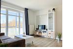 Wohnzimmer mit Zugang zum Balkon - Wohnung 42 - Top-Hundeurlaub