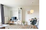 Wohnzimmer mit TV - Wohnung 42 - Top-Hundeurlaub