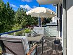 Balkon mit Sonnenschirm - Wohnung 42 - Top-Hundeurlaub