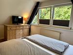 Schlafzimmer - Reiherweg Ferienhaus - Top-Hundeurlaub