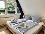 Schlafzimmer - Reiherweg Ferienhaus - Top-Hundeurlaub