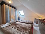 Schlafzimmer - Ferienwohnung Leuchtturm Norddeich - Top-Hundeurlaub
