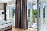 Schlafzimmer mit Balkon - Strandresidenzen Binz-Prora V0.1 - Top-Hundeurlaub