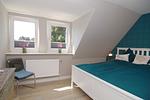 Schlafzimmer - Ferienhaus Westhüs - Top-Hundeurlaub