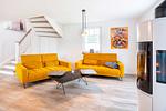 Wohnzimmer - Ferienhaus Baltic Huus mit Sauna, Kamin und Sonnenterrasse - Top-Hundeurlaub