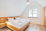 Schlafzimmer - Ferienhaus Baltic Huus mit Sauna, Kamin und Sonnenterrasse - Top-Hundeurlaub
