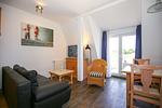 Wohnzimmer mit Zugang zum Balkon - Wohnung 15 - Top-Hundeurlaub