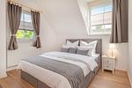 Schlafzimmer - Ferienhaus Wiesenblick mit Kamin, Terrasse, Badewanne und Dusche - Top-Hundeurlaub