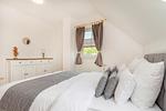 Schlafzimmer - Ferienhaus Wiesenblick mit Kamin, Terrasse, Badewanne und Dusche - Top-Hundeurlaub