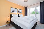 Schlafzimmer - Beach Apartment 7 mit Balkon, Gemeinschaftssauna und Grillplatz - Top-Hundeurlaub