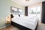 Schlafzimmer - Beach Apartment 5 mit Balkon, Gemeinschaftssauna und Grillplatz - Top-Hundeurlaub
