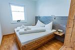 Schlafzimmer 1, Doppelbett - Happy Aich 3 by Alpenidyll Apartments - Top-Hundeurlaub