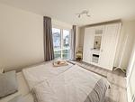 Schlafzimmer mit Doppelbett - Inselblick (E014) - Top-Hundeurlaub