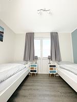 Schlafzimmer mit Einzelbetten - Inselblick (E014) - Top-Hundeurlaub