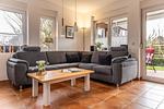 Wohnzimmer - Ferienwohnung Gartenland C2 - Top-Hundeurlaub