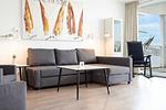 Wohnbereich mit Sessel - Promenadenvilla 03 Wohnung 07 - Top-Hundeurlaub