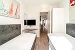 2. Schlafzimmer mit Blick zum TV - Promenadenvilla 03 Wohnung 07 - Top-Hundeurlaub