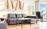 Wohnbereich mit Sitzecke und Couchtisch - Promenadenvilla 03 Wohnung 07 - Top-Hundeurlaub