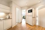 Küche mit Kühlschrank und Mikrowelle - Promenadenvilla 03 Wohnung 09 - Top-Hundeurlaub