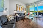 Wohnzimmer mit Blick zur Terrasse - Promenadenvilla 03 Wohnung 10 - Top-Hundeurlaub