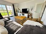 Wohnzimmer - Deichblick 1 - Top-Hundeurlaub