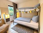 Etagenbett (140x200 und 90x200cm) im Kinderschlafzimmer - Ferienhaus an der Au - Top-Hundeurlaub