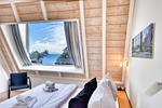 Schlafzimmer - Ferienwohnung Bernstein in der Villa Rex Sellin - Top-Hundeurlaub