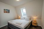 Schlafzimmer - Strandoase 5 - Penthouse (Seeblick) - Top-Hundeurlaub