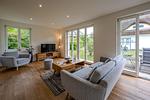 Wohnzimmer - Haus Leichte Brise - Top-Hundeurlaub