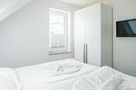 Schlafzimmer - Dünenquartier Apartment 08 - Top-Hundeurlaub