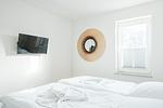 Schlafzimmer - Dünenquartier Apartment 08 - Top-Hundeurlaub
