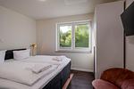 Schlafzimmer - Dünenquartier Apartment 06 - Top-Hundeurlaub