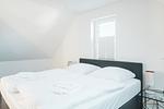 Schlafzimmer - Dünenquartier Apartment 10 - Top-Hundeurlaub