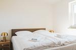 Schlafzimmer - Dünenquartier Apartment 15 - Top-Hundeurlaub