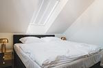 Schlafzimmer - Dünenquartier Apartment 17 - Top-Hundeurlaub