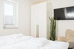 Schlafzimmer - Dünenquartier Apartment 30 - Top-Hundeurlaub